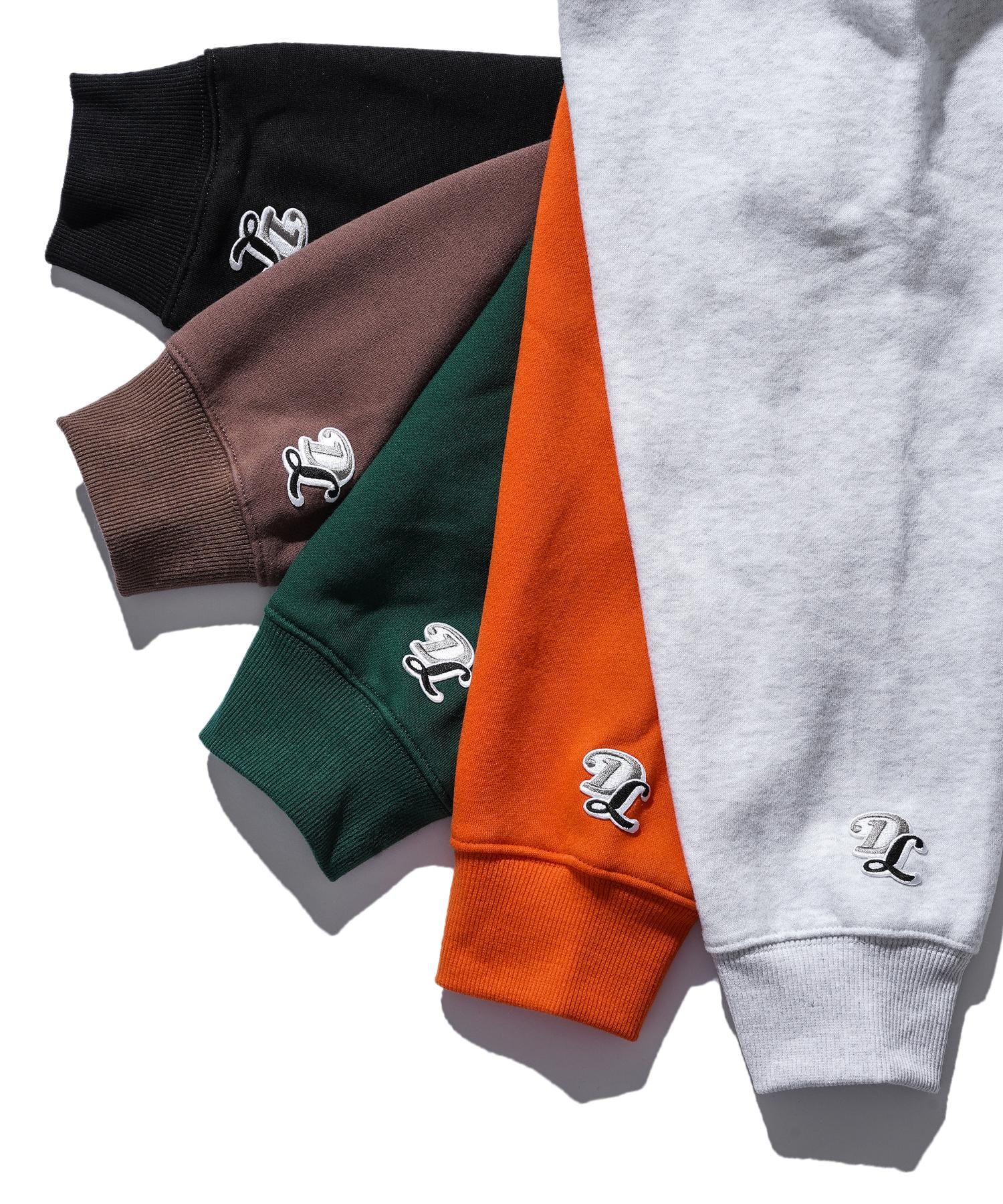 DUALISM/DLSM(デュアリズム) フードパーカー WORLD LOGO HOODIE 公式