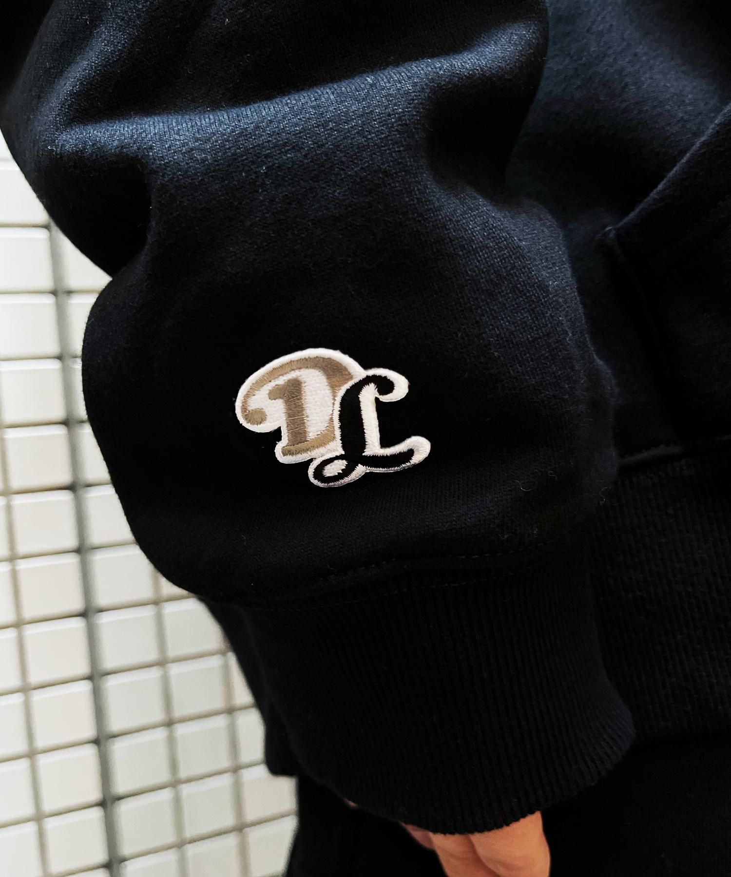 DUALISM/DLSM(デュアリズム) フードパーカー WORLD LOGO HOODIE 公式