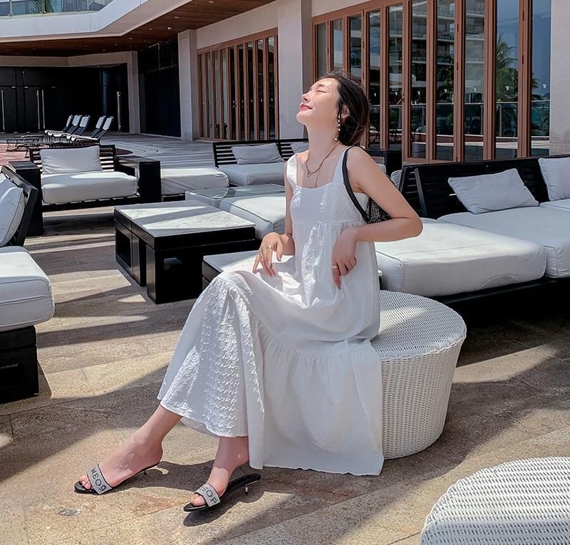 清楚かわいい海外デザイン ラフな着心地のノースリーブ白ロング 清楚かわいい海外デザイン ラフな着心地のノースリーブ白ロング