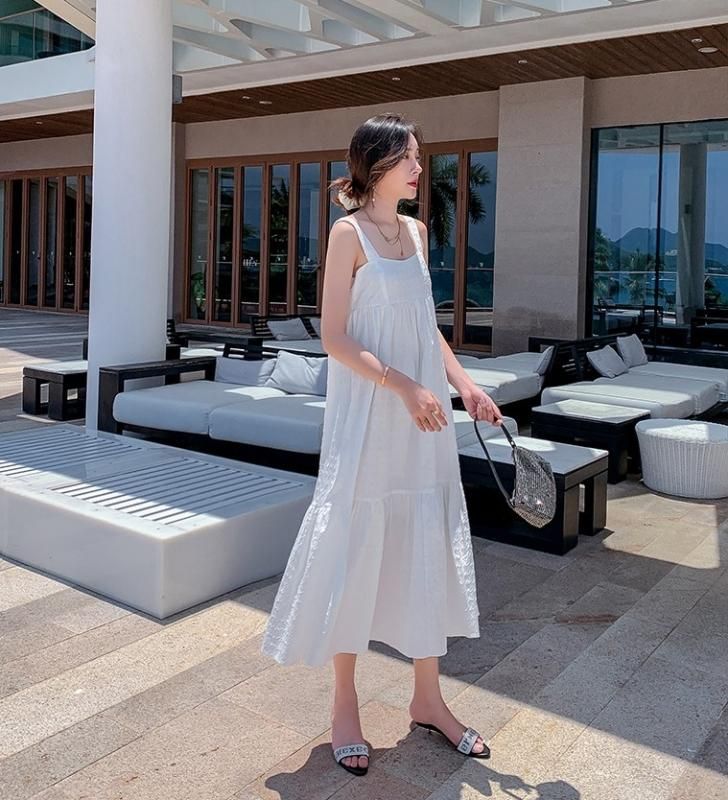 清楚かわいい海外デザイン ラフな着心地のノースリーブ白ロング 清楚かわいい海外デザイン ラフな着心地のノースリーブ白ロング