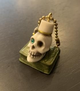 Book on fezzhat skull key chain