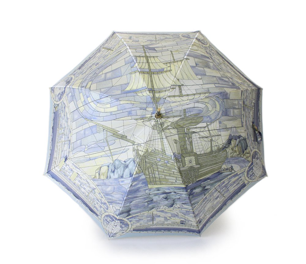 イエローとブルーが使われている大柄の帆船模様の傘です。