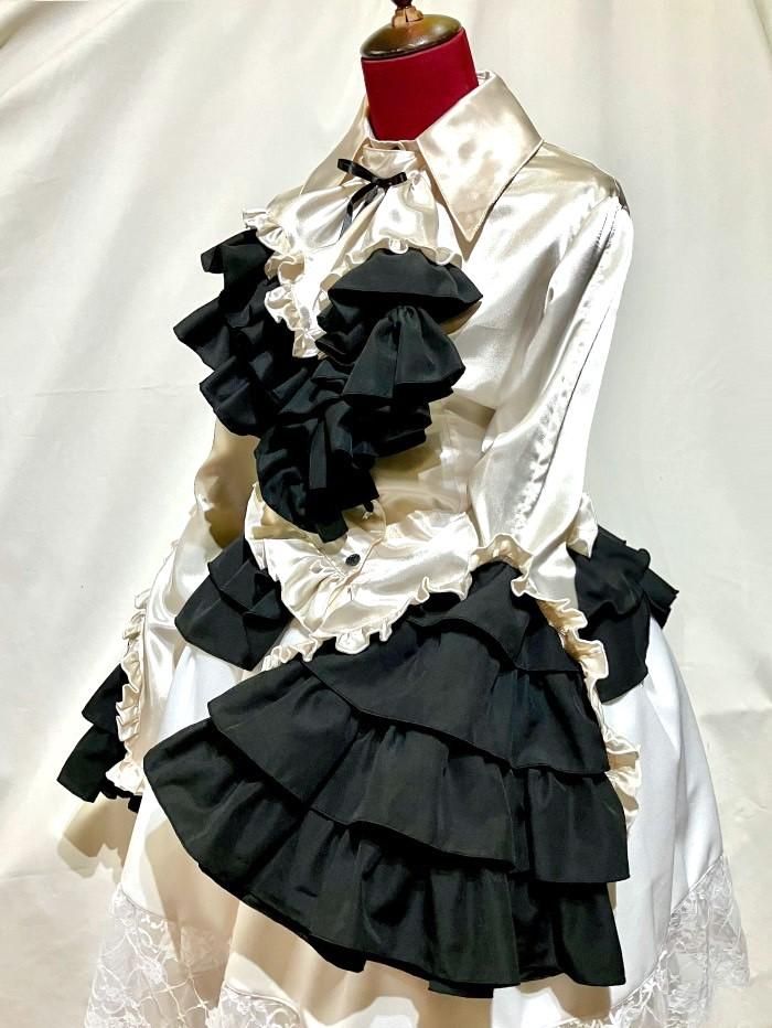 十字架タイ付き総フリルドレスブラウス：オフ白×黒 - MARBLE