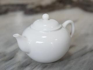 Two inscribed Yixing teapots, Qing dynasty, 19th century