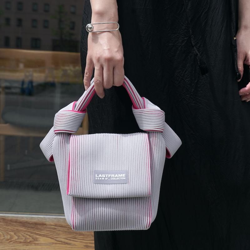 LASTFRAME(ラストフレーム)のTWO TONE OBI BAG GREEN x NEON