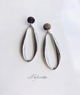 Silver oval hoop pierce