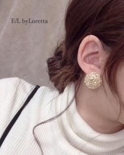 Gold circle motif pierce