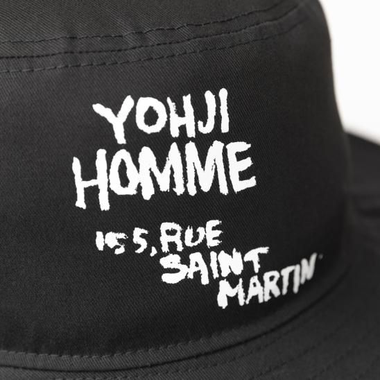 YOHJI YAMAMOTO X NEW ERA | ADVENTURE WIDE BRIM YY ADDRESS PAINT / BLACK