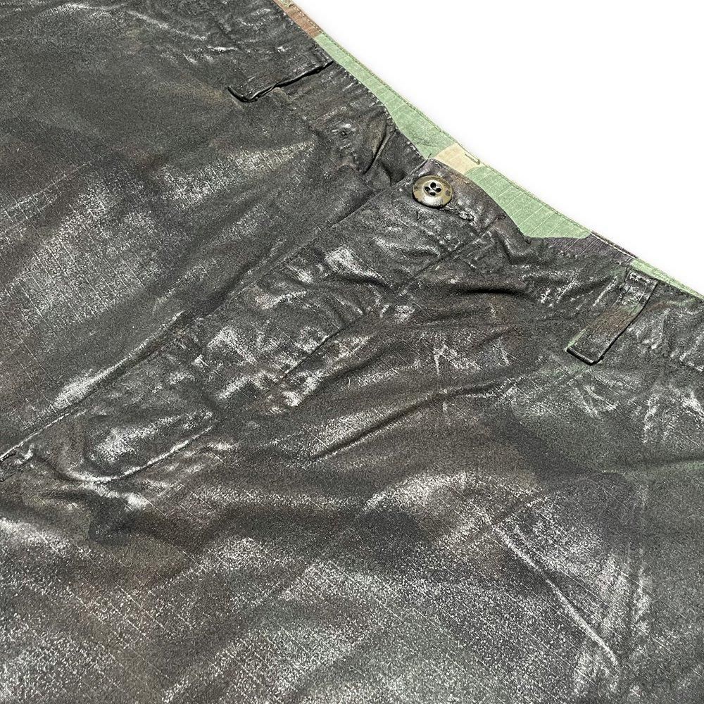 INNOCENCE | CAMO WAX PANTS / BLACK