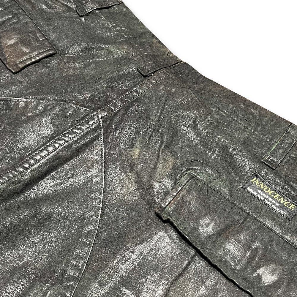 INNOCENCE | CAMO WAX PANTS / BLACK