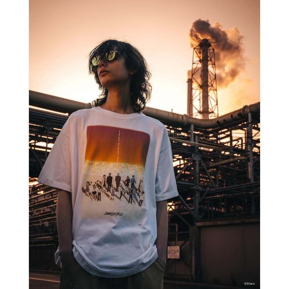 SAINT MXXXXXX | EV_SS TEE ORANGE / WHITE