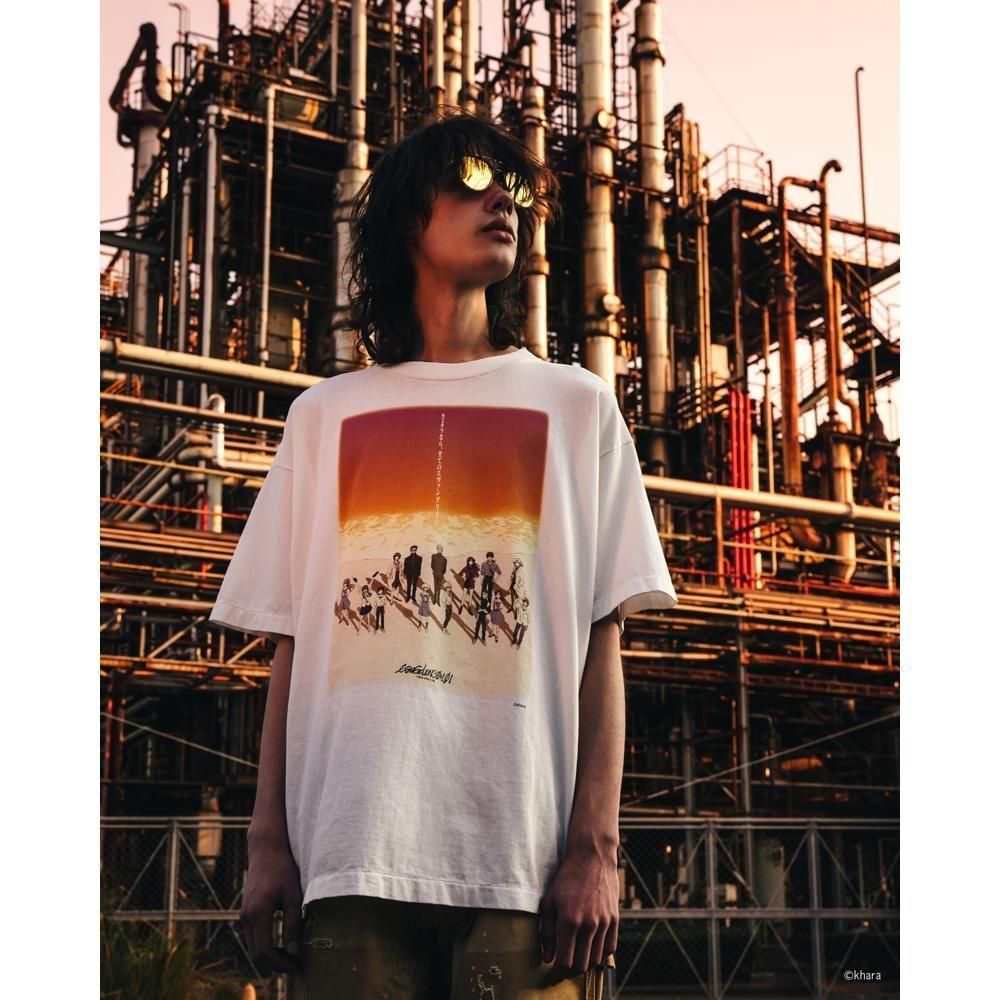 SAINT MXXXXXX | EV_SS TEE ORANGE / WHITE