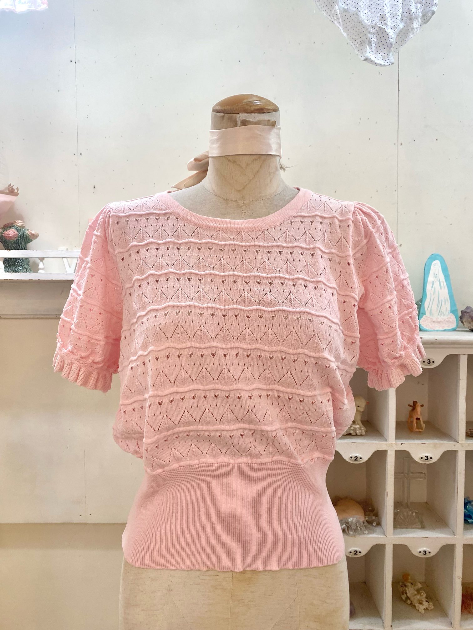 pink knit top