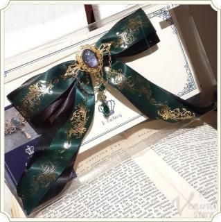 <img class='new_mark_img1' src='https://img.shop-pro.jp/img/new/icons14.gif' style='border:none;display:inline;margin:0px;padding:0px;width:auto;' />魔法石のリボンブローチ（緑）