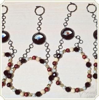 <img class='new_mark_img1' src='https://img.shop-pro.jp/img/new/icons14.gif' style='border:none;display:inline;margin:0px;padding:0px;width:auto;' />手の目ブレスレット（赤・青)