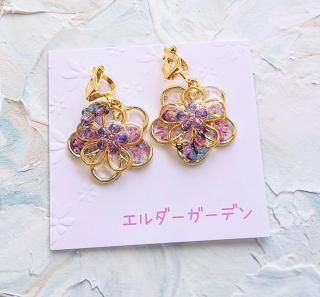 <img class='new_mark_img1' src='https://img.shop-pro.jp/img/new/icons26.gif' style='border:none;display:inline;margin:0px;padding:0px;width:auto;' />『Flower solid』八重蝶イヤリング（パープル）