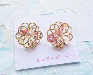 <img class='new_mark_img1' src='https://img.shop-pro.jp/img/new/icons26.gif' style='border:none;display:inline;margin:0px;padding:0px;width:auto;' />『Flower solid』八重蝶ピアス（オレンジ）