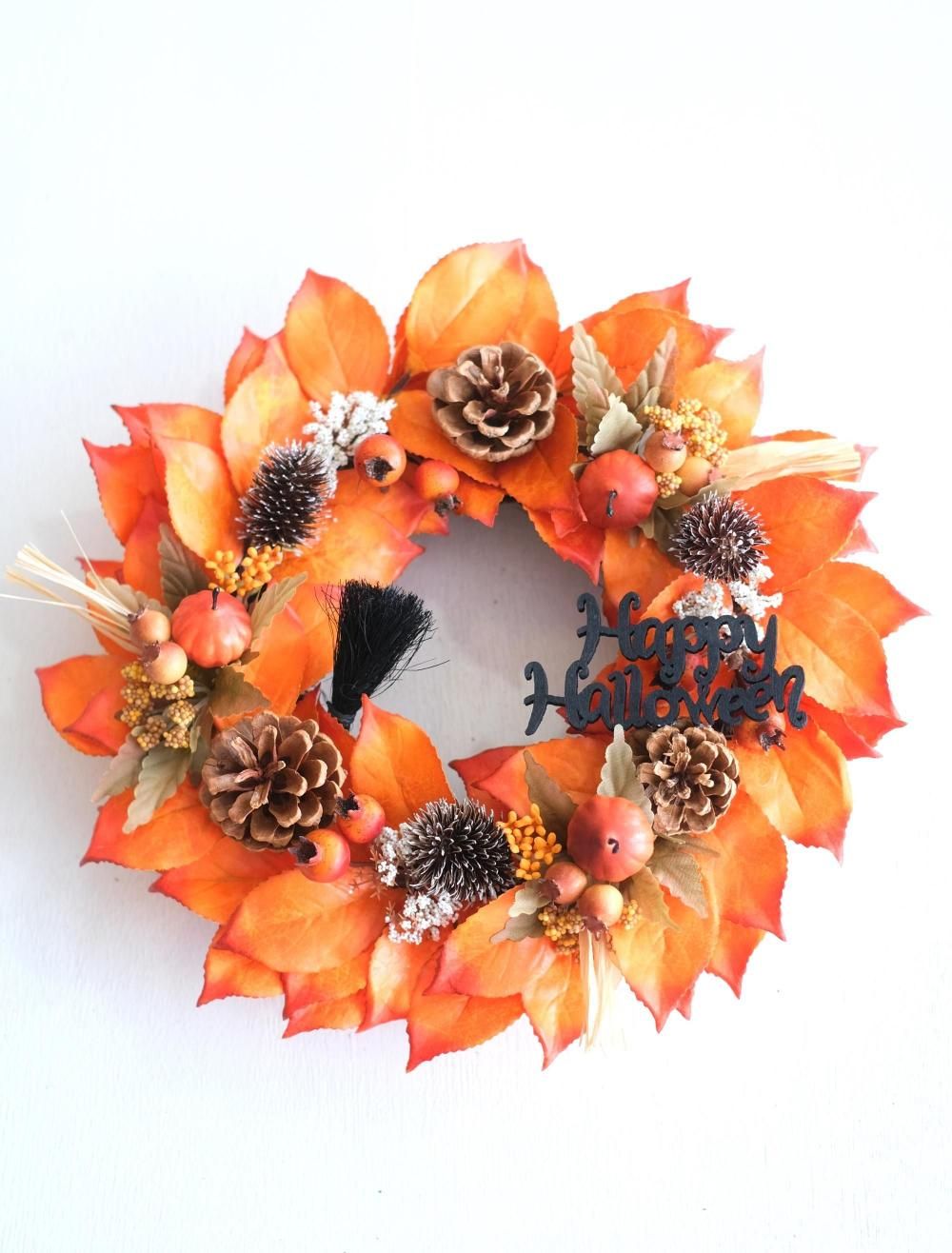 秋の実りのフライングリース　ハロウィン　シャリンバイ パンプキンと木の実 赤・青りんごのリース：ハロウィン オレンジ
