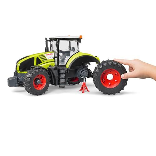 Amazon.com: Bruder Claas Axion 950 with Snow Chai : Toys