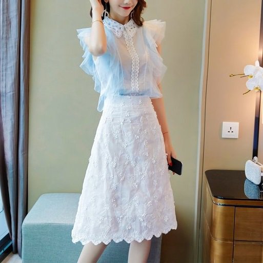韓国のシックな気質の有名人のドレスの女性の春フリル長袖タイトなヒップスカート