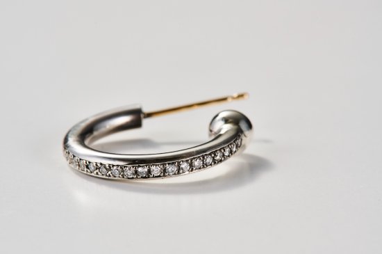 LARGE HAND-BENDING PIERCED EARRING  WITH DIAMONDS
