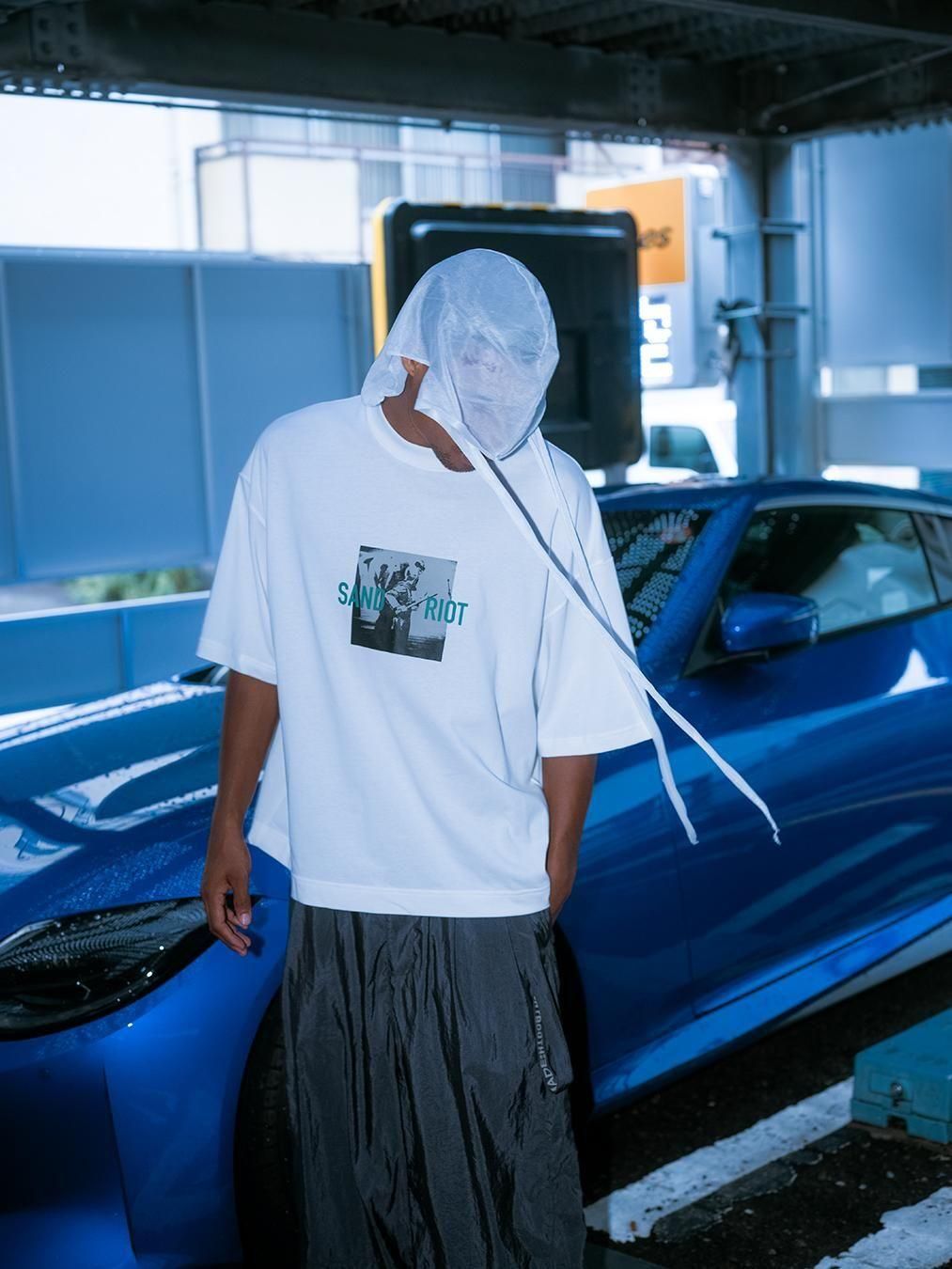 GOOPiMADE®xTIGHTBOOTH Sand Riot Logo Tee GOOPiMADE®xTIGHTBOOTH Sand Riot Logo Tee GOOPiMADE® x