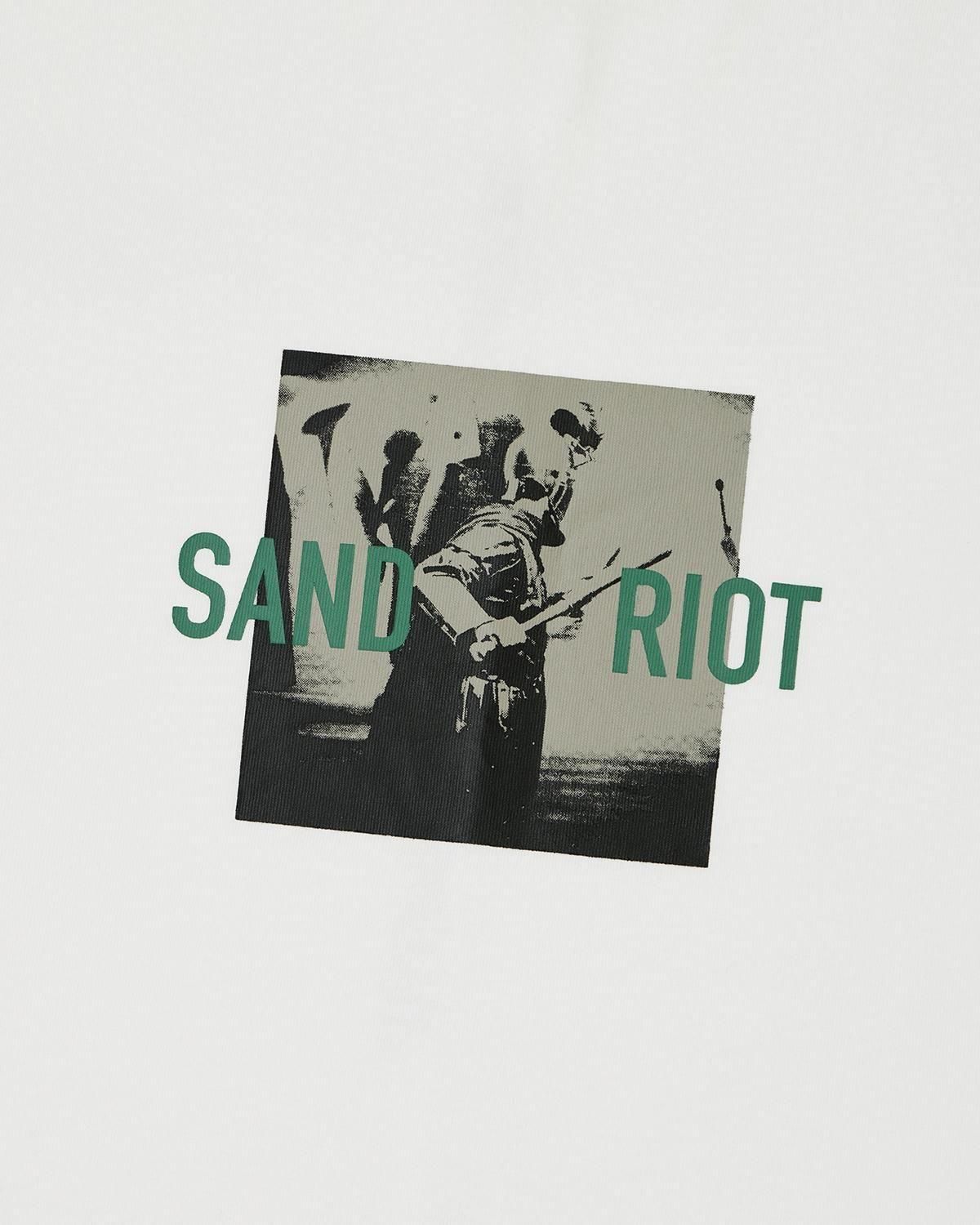 GOOPiMADE®xTIGHTBOOTH Sand Riot Logo Tee GOOPiMADE® x TIGHTBOOTH - Sand Riot Logo Tee - TIGHTBOOTH