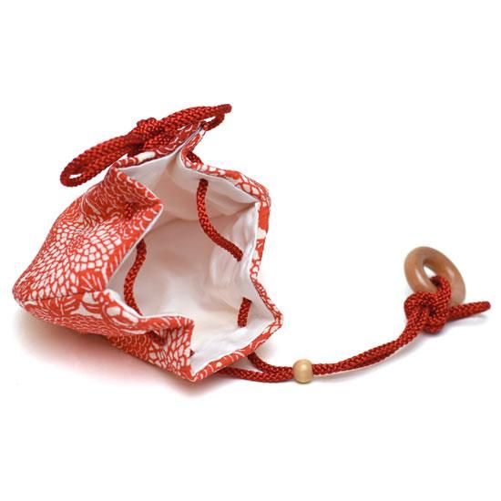 フルーツバスケットお守り　赤い巾着セット コウペンちゃん 収穫祭！ 巾着お守り（花丸だるま） – コウペンちゃん