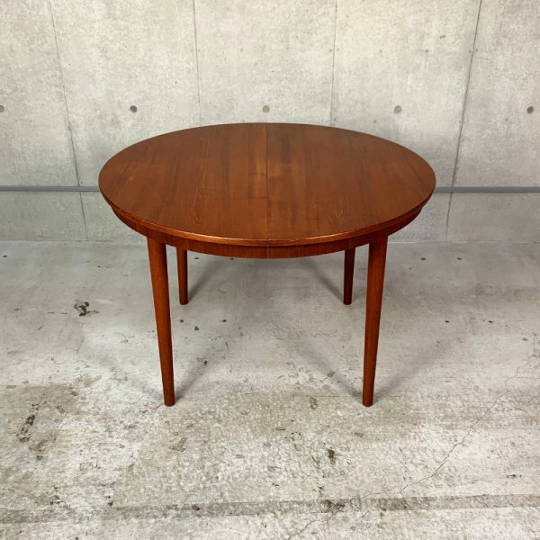 teak circular dining table