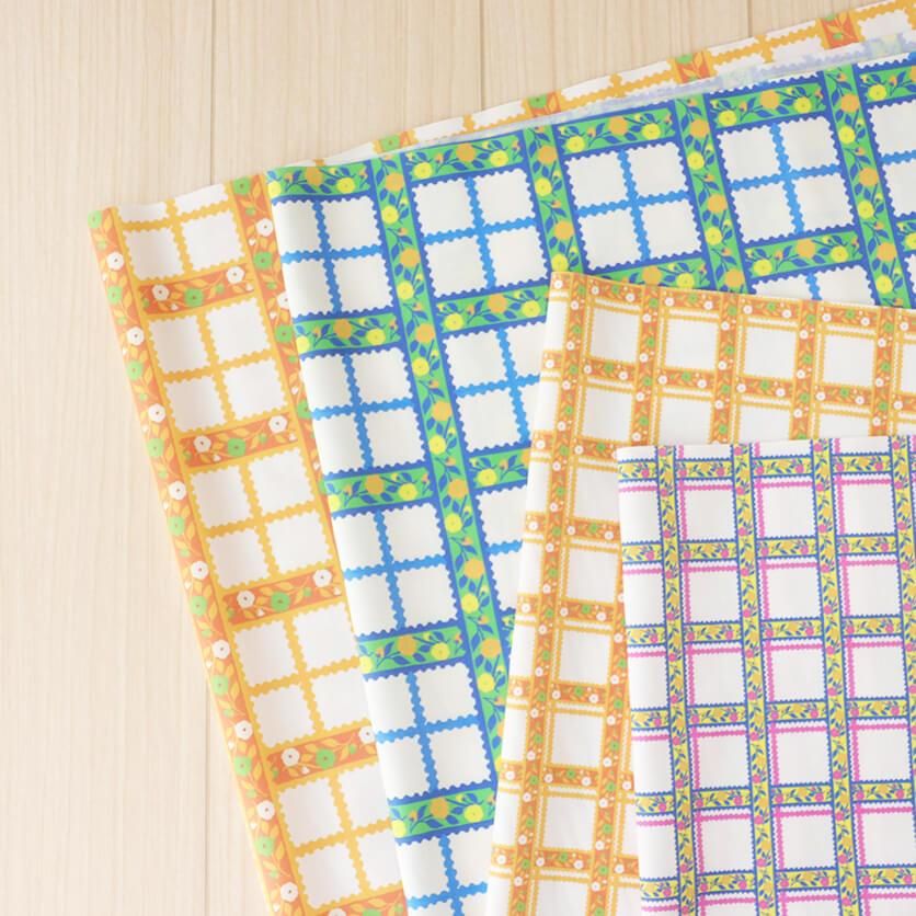 チロリアンテープチェック（オレンジ）チェック・花柄- 布・生地の通販