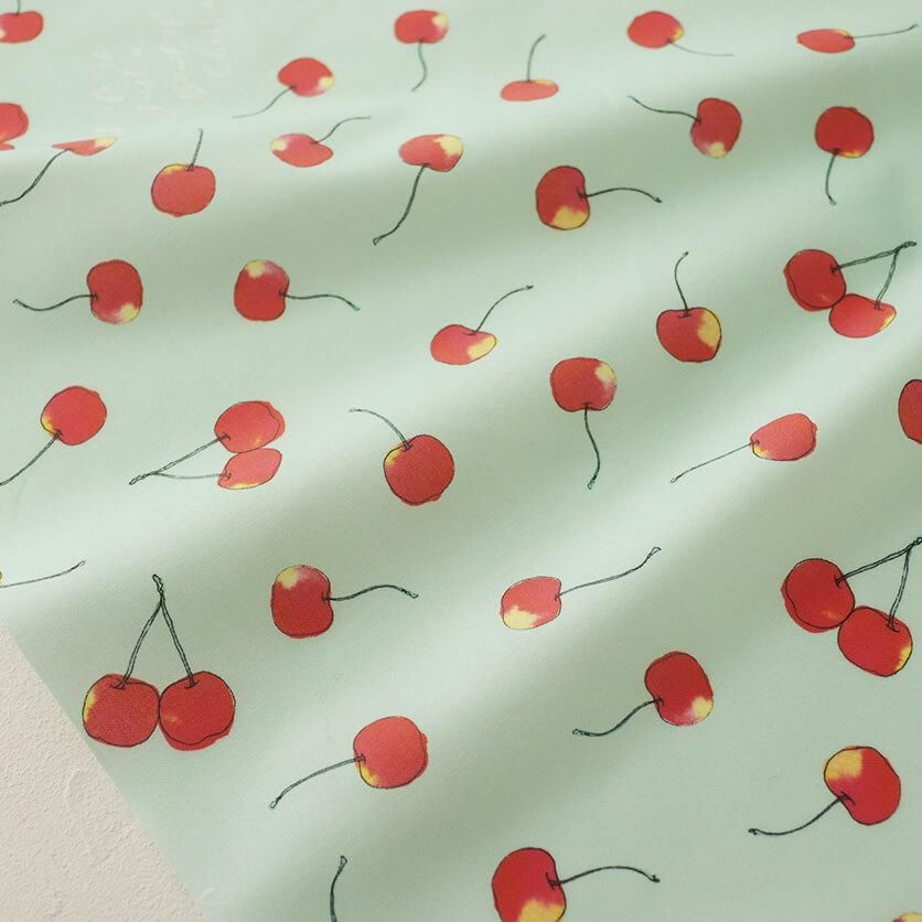 cherry(グリーン)フルーツ・さくらんぼ柄- 布・生地の通販サイト:nunocoto fabric ヌノコトファブリック nunocoto さくらんぼ柄 コットンリネン ビエラ
