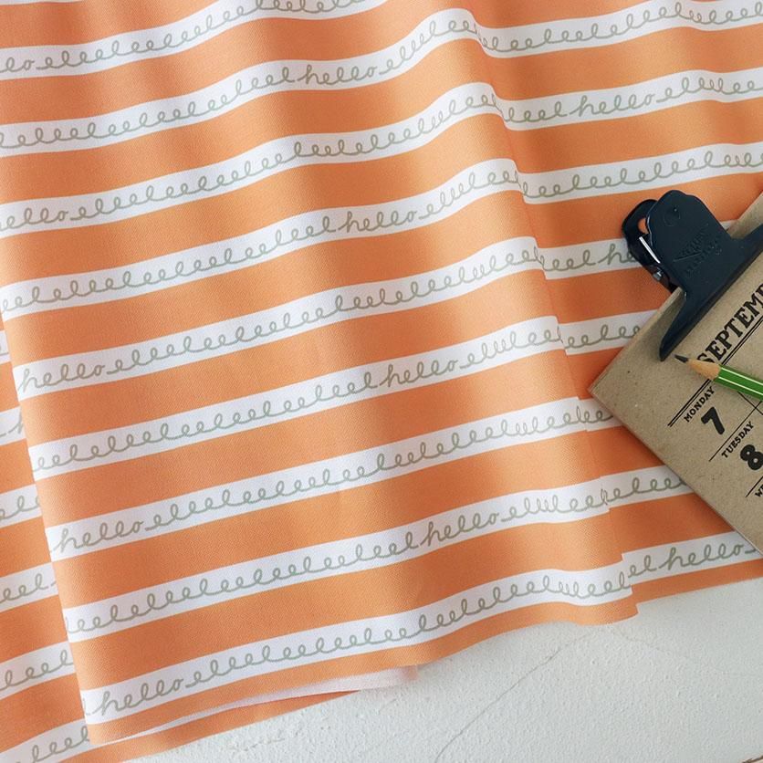 くるっくるっくるん しましま（オレンジ）幾何学模様- 布・生地