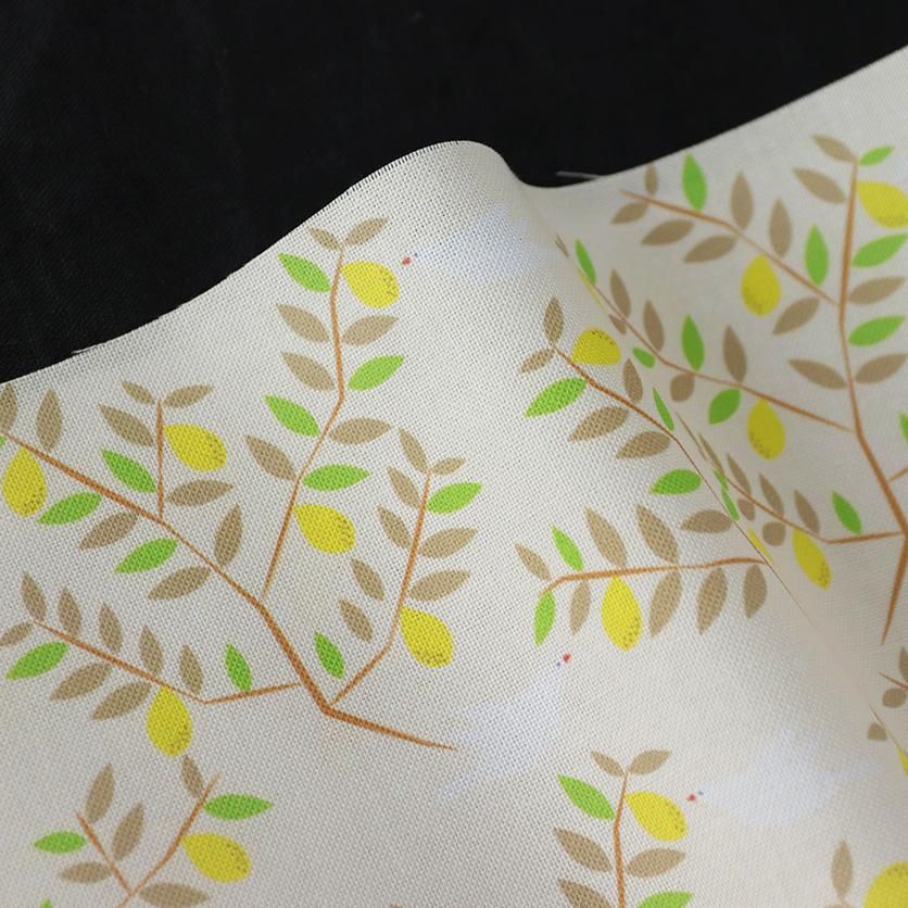 レモンと白い鳥 （ベージュ）おしゃれ柄- 布・生地の通販サイト