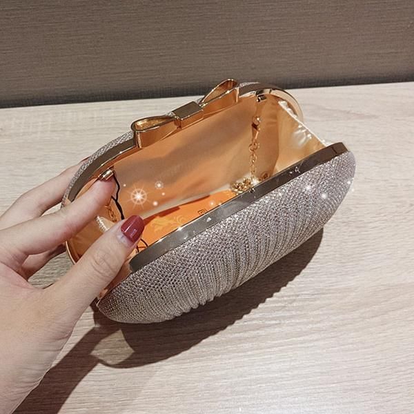 クラッチバッグ リボン スパンコール 貝殻 フェミニン 華やか
