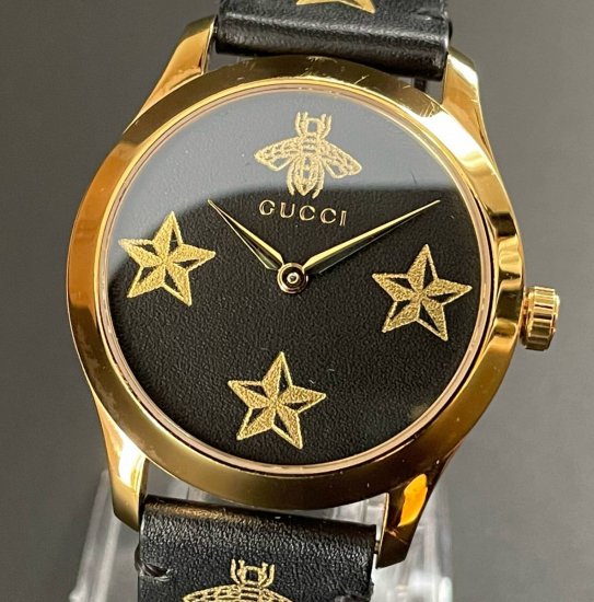 未使用】グッチ 腕時計 Gタイムレス 金 × 黒 ビー スター ユニセックス