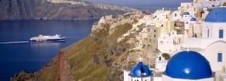Panoramic Images  Buildings in a valley Santorini Cyclades Islands Greece ե󥢡
