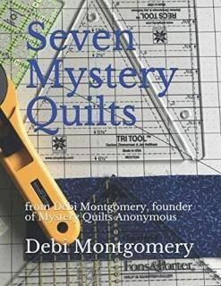 Seven Mystery Quilts by Debi Montgomery founder of Mystery Quilts Anonymous