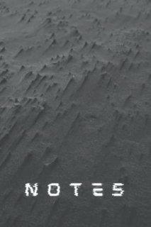 Dune notebook with dark sand