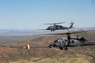 Stocktrek Imagesˤ2ĤHH-60 Pave Hawks refuel over the Desert around Davis-Month