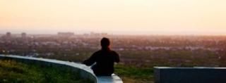 Posterazzi Man sting on the ledge in Baldwin Hills Scenic Overlook Park Culver C