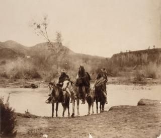 Apache  C1903 NAt The Ford Group Of Apache Men On Horseback At A Stream Photo