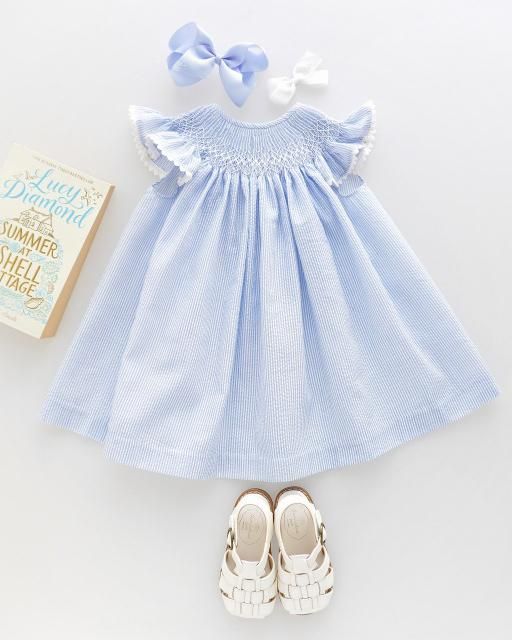 <img class='new_mark_img1' src='https://img.shop-pro.jp/img/new/icons1.gif' style='border:none;display:inline;margin:0px;padding:0px;width:auto;' />Celeste rayas smocked bishop dress