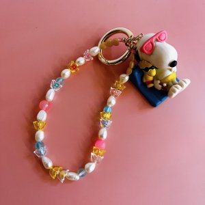 <img class='new_mark_img1' src='https://img.shop-pro.jp/img/new/icons14.gif' style='border:none;display:inline;margin:0px;padding:0px;width:auto;' />FLOWER  BEACH SNOOPY STRAP 