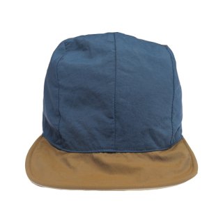 <img class='new_mark_img1' src='https://img.shop-pro.jp/img/new/icons47.gif' style='border:none;display:inline;margin:0px;padding:0px;width:auto;' />Mont-Bell Reversible Bird Bill Cap - Navy/Beige - Deadstock