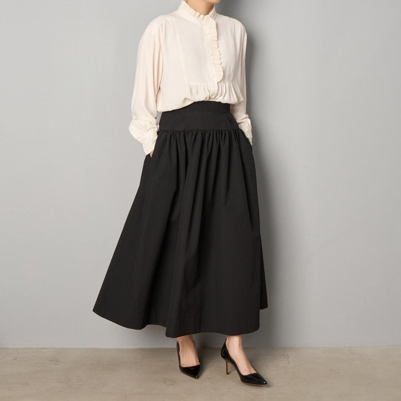 Pale Jute <BR>Black skirt <BR>black