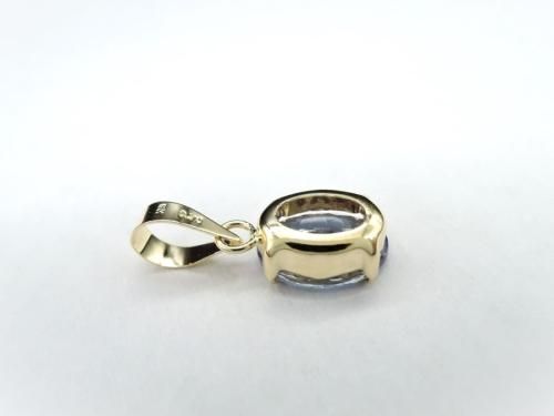 神秘の多色性】 タンザナイトペンダントトップK18YG 0.7ct