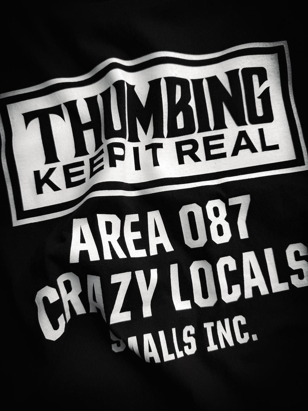 THUMBING