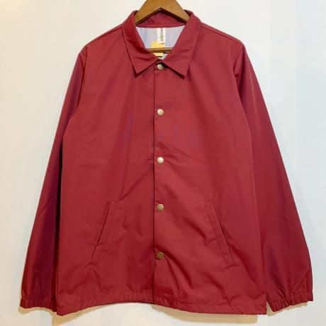 <div>INDEPENDENT</div>WATER RESISTANT<br>NYLON COACH JACKET<br>BURGANDY