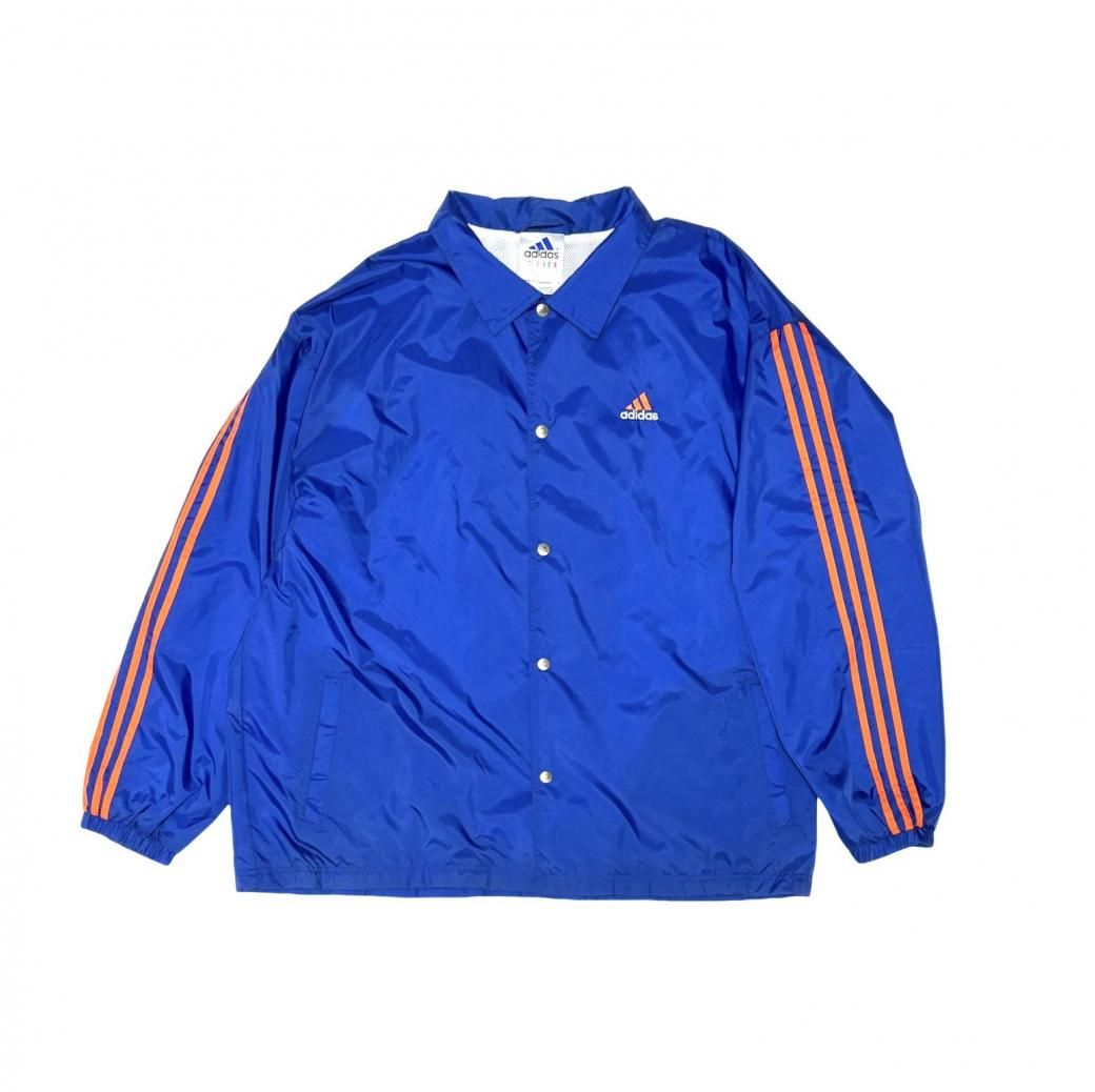 <div>Adidas</div>DEAD STOCK<br>NYLON COACH JACKET<br>BLUxORG