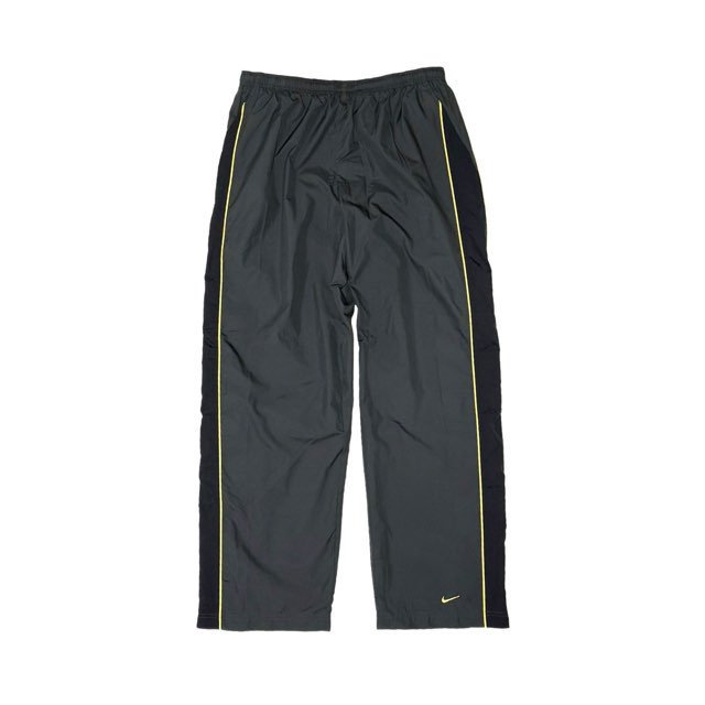 <div>NIKE</div>NYLON TRACK PANTS<br>07's DEADSTOCK<br>SWOOSHSIDE LINE<br>D.GRYxYEL w LINNER